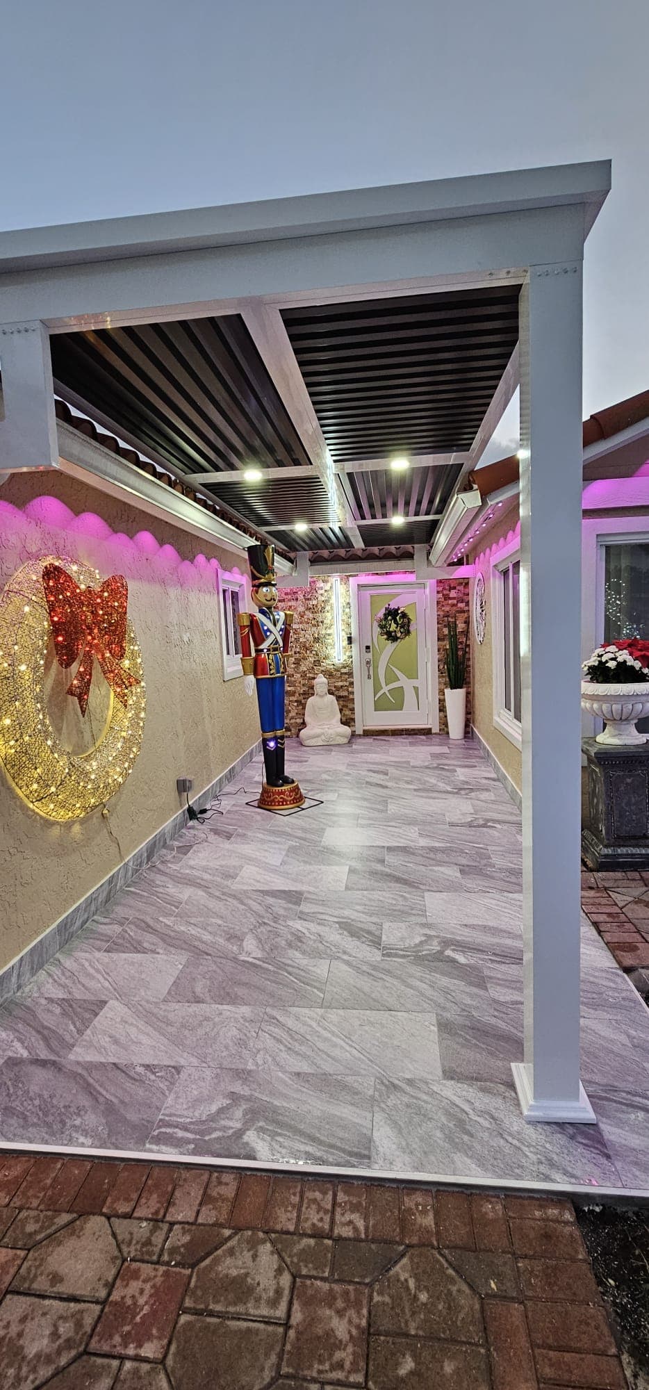 EDCA Builders — covered entrance with marble flooring