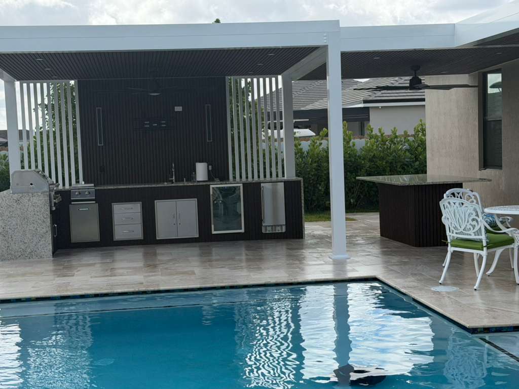 EDCA Builders — pool and pergola project at night